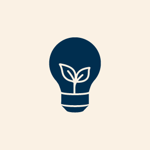Sustainable energy symbol with plant inside light bulb