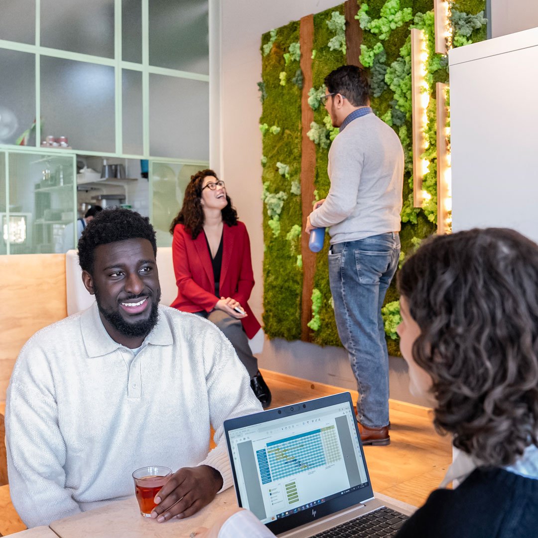 Colleagues together at the Amsterdam office