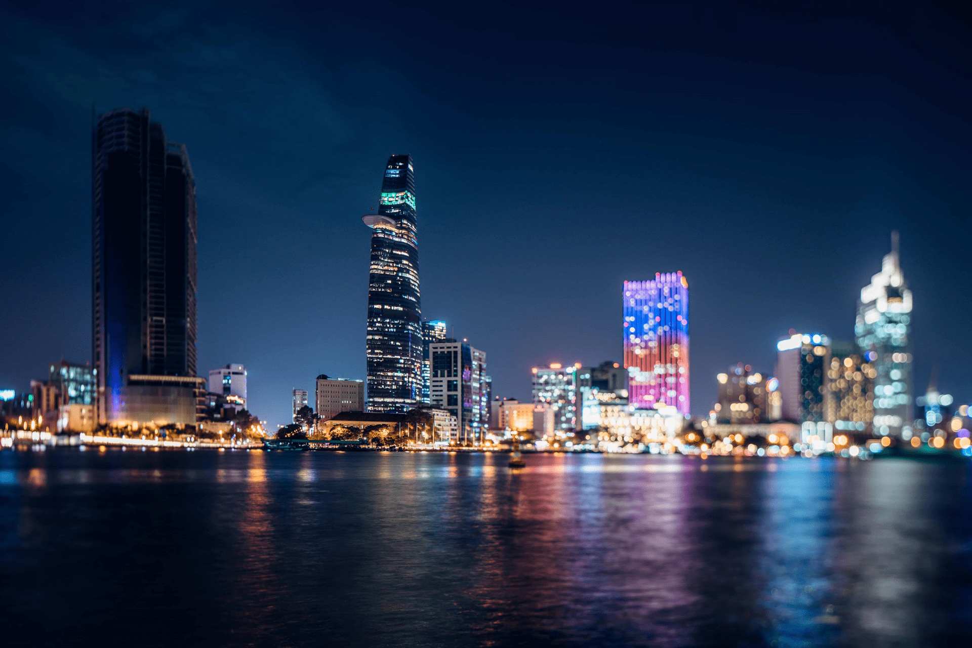 View of the city at night with lit up buildings