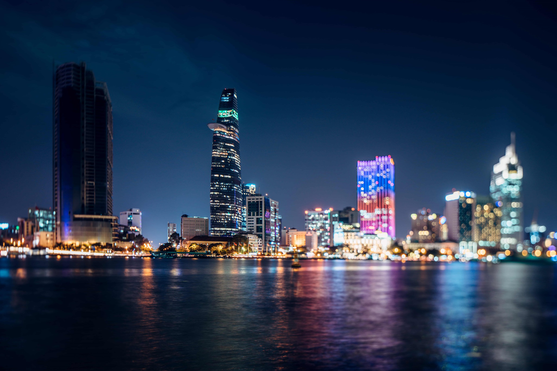 View of the city at night with lit up buildings
