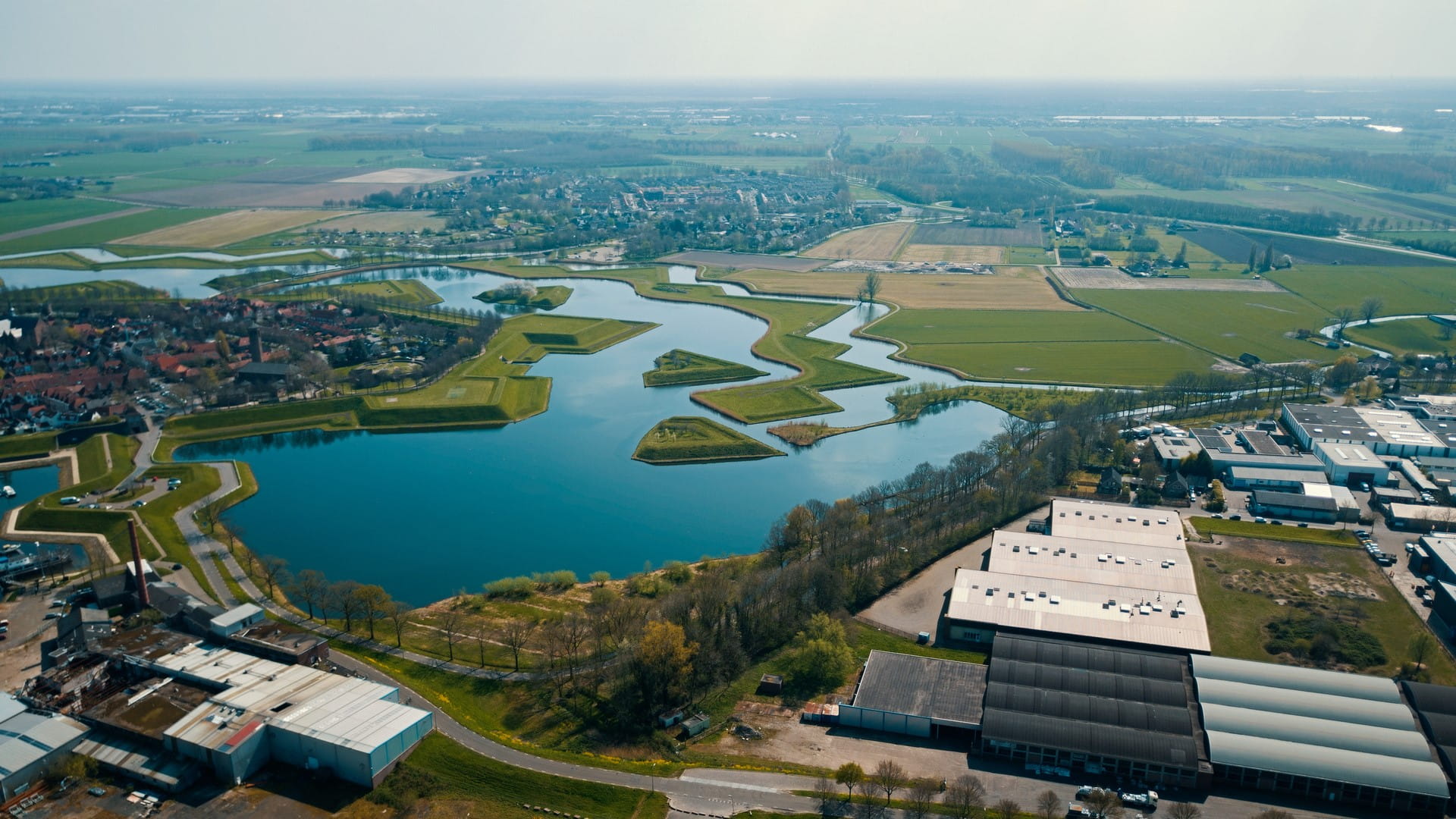 Flat landscape with land and water