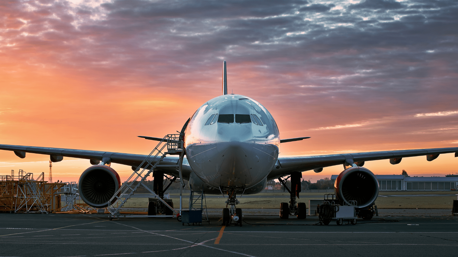 an airplane sits on a runway