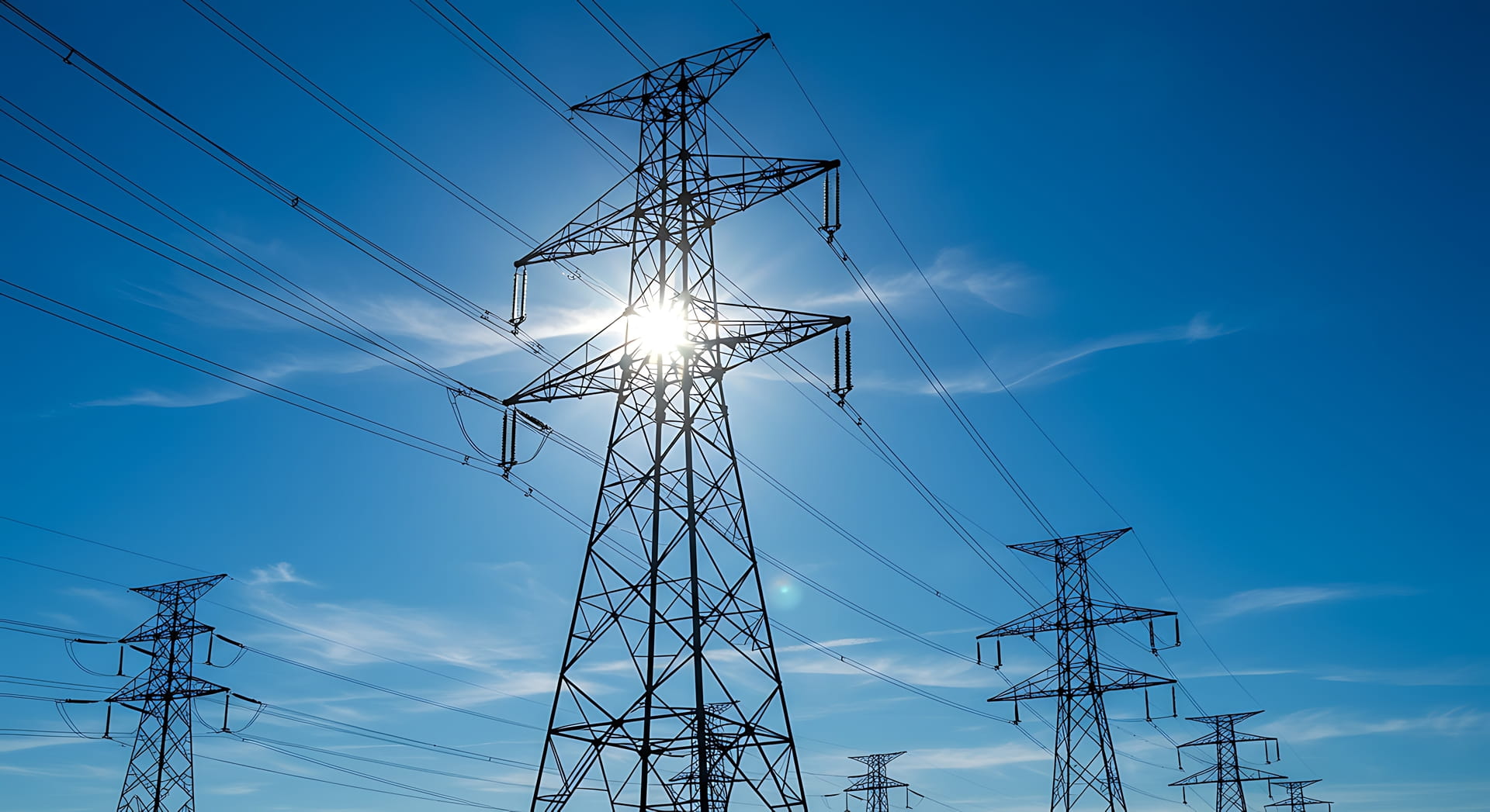 High-voltage power lines and transmission towers.