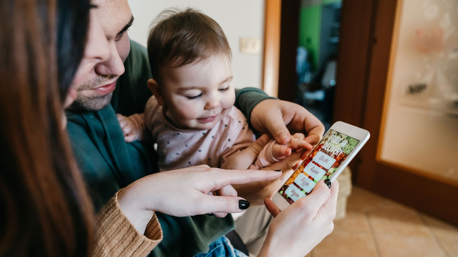 Family looking at mobile