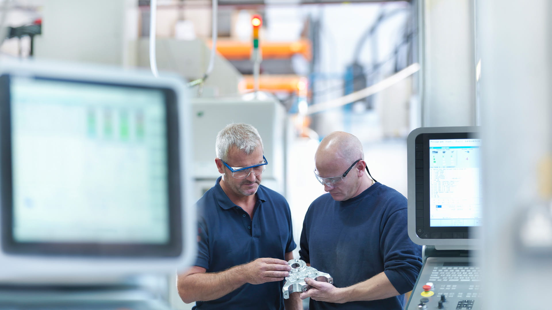 two engineers discussing industrial process