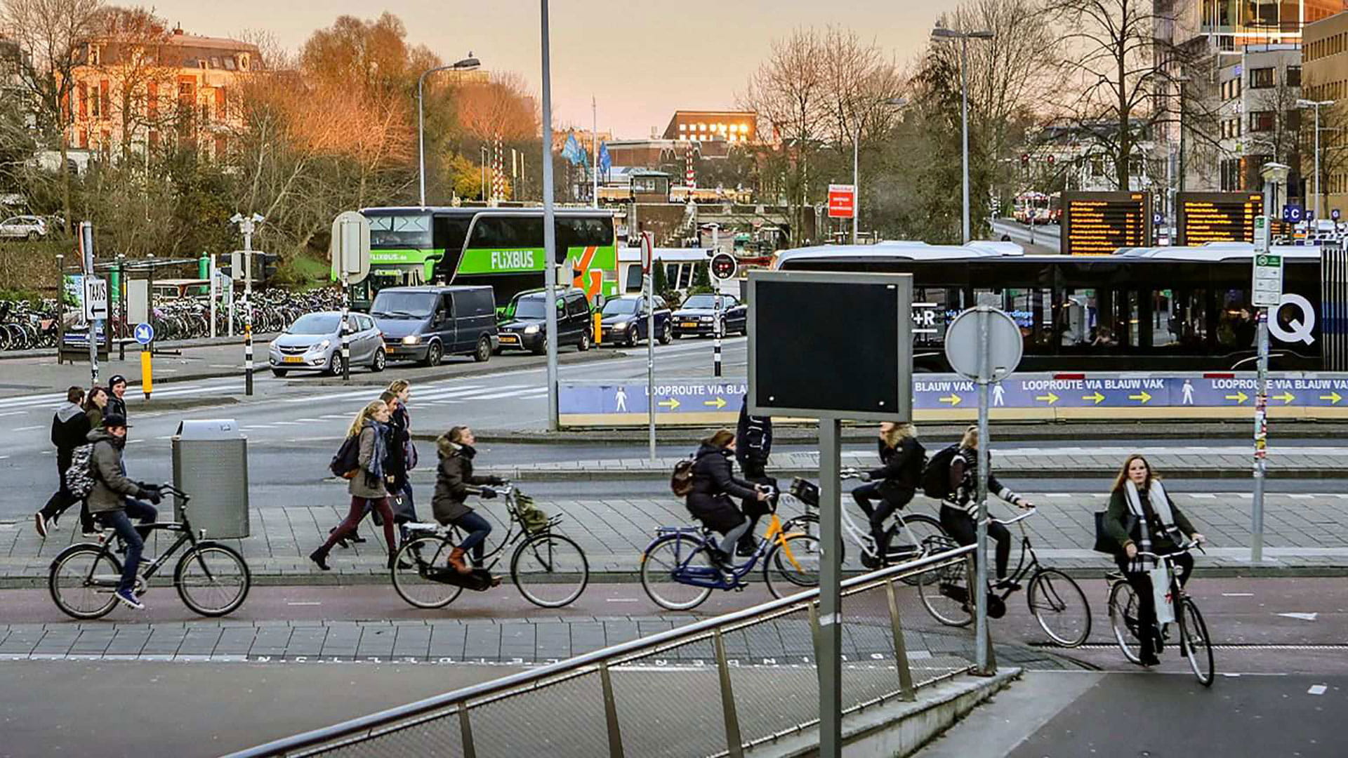 People using different transportation on the street