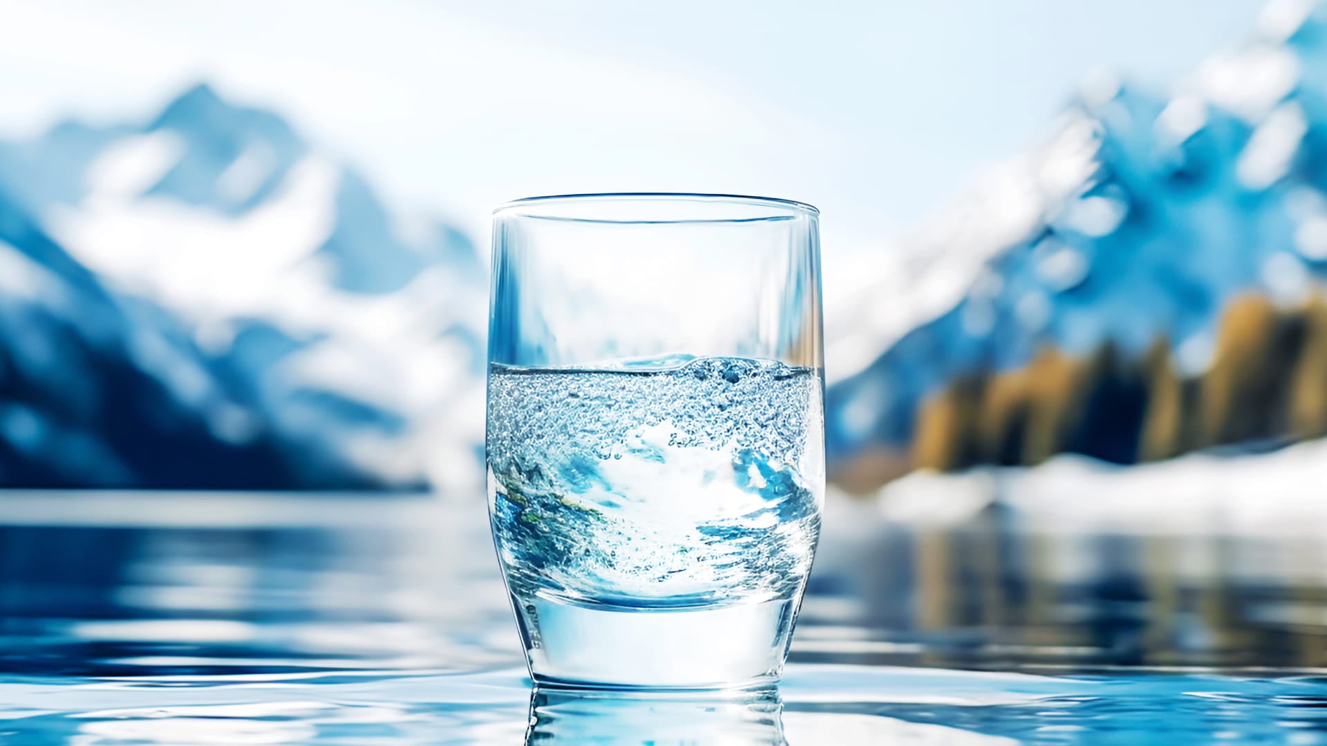 Glass of pouring drinking water
