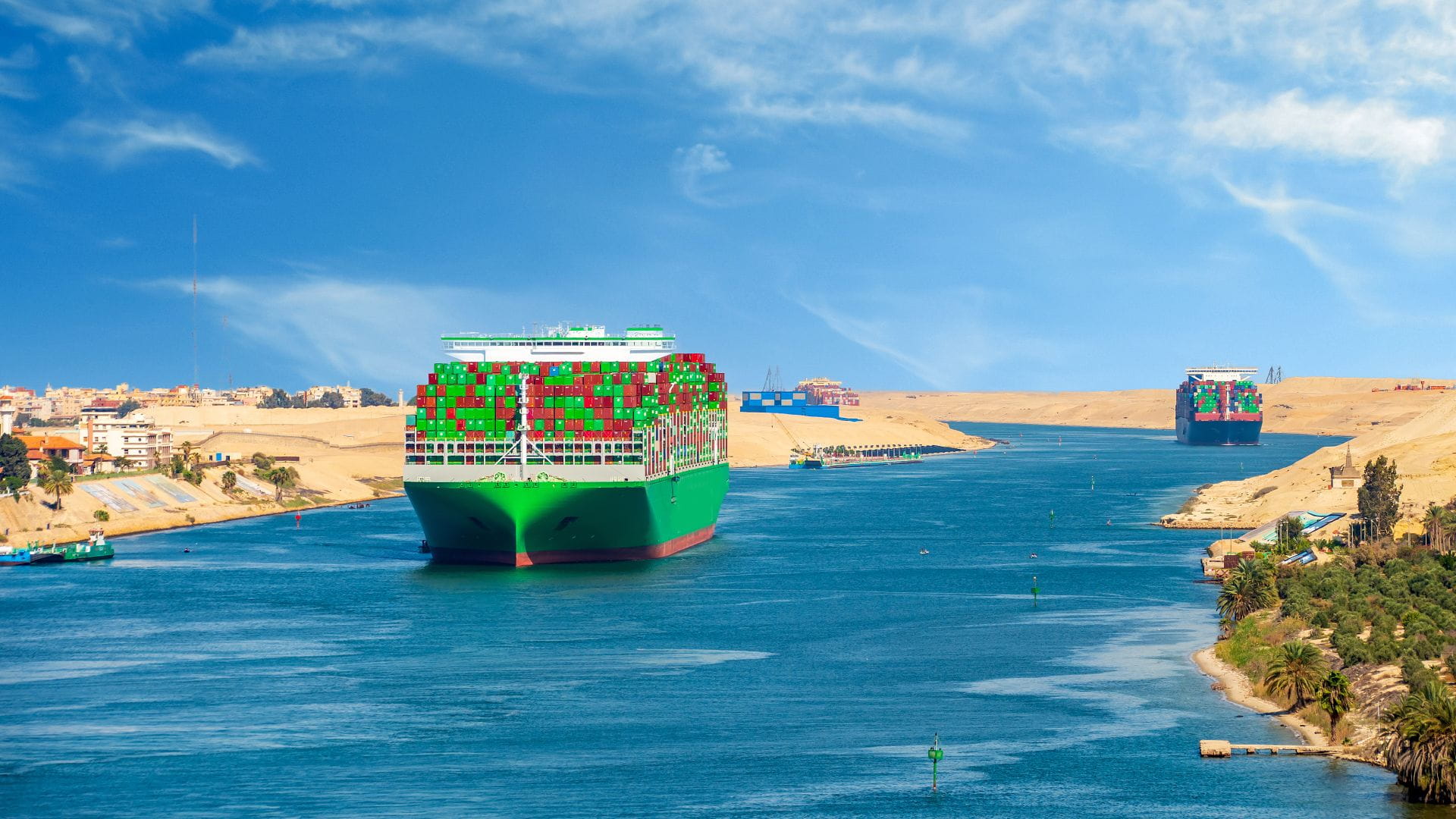 A shipping container ship travelling down the Suez Canal