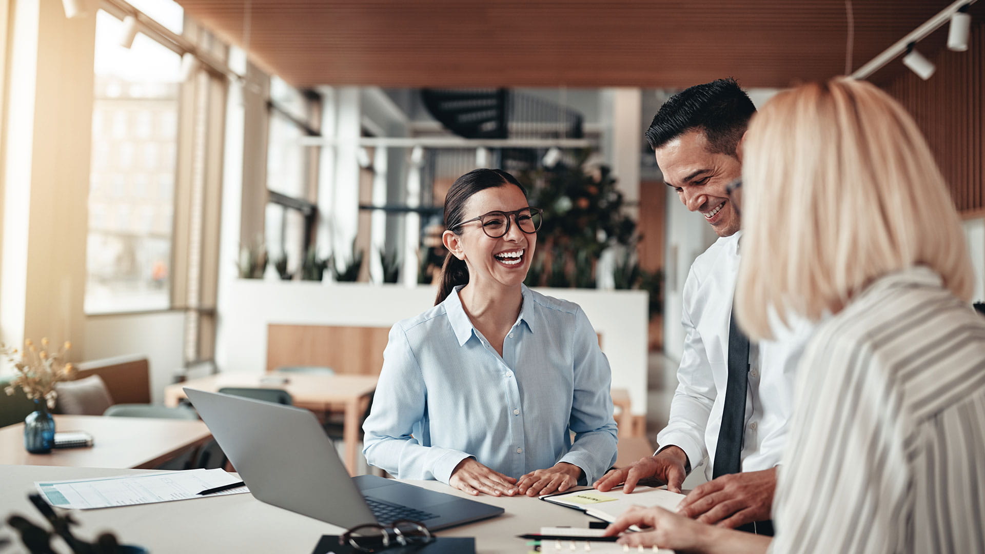 People thare are laughing and working in a workplace concept