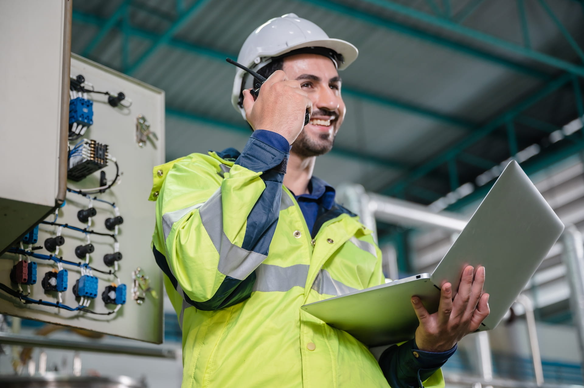 Professional technician engineer working to control electrical power and safety service system