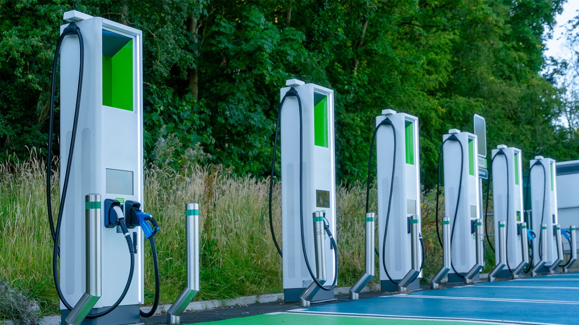 Electric Vehicle charging stations in green surroundings