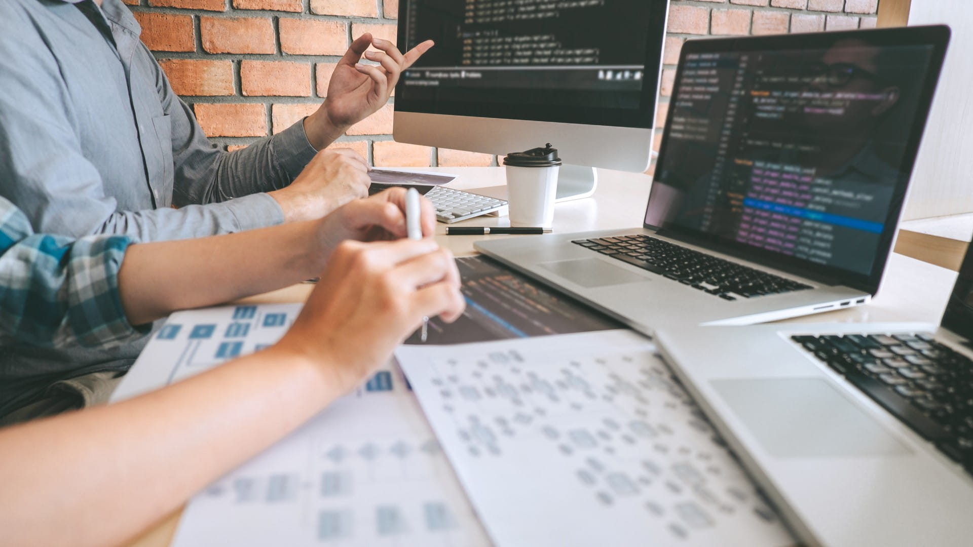 Developers writing code