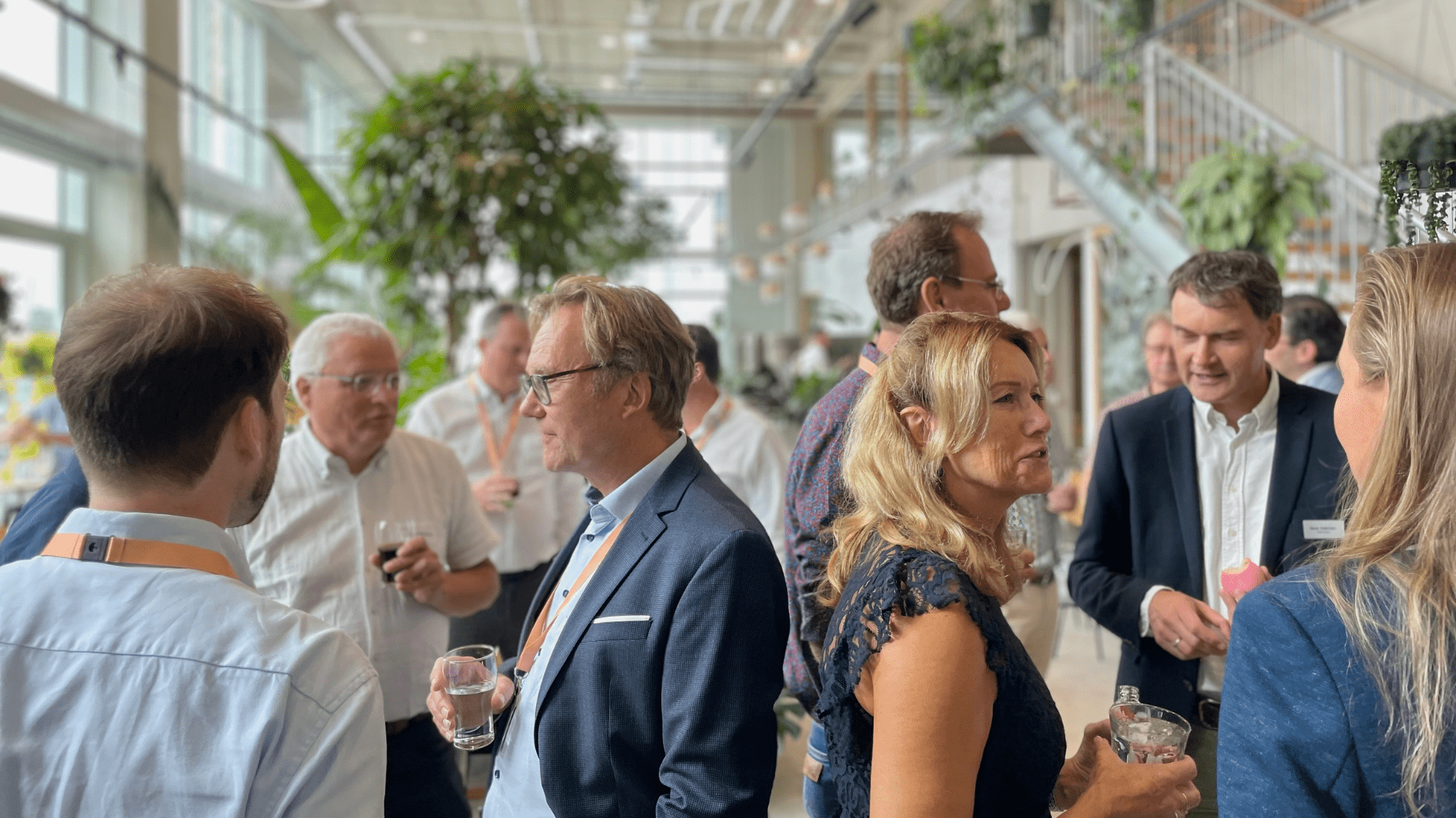 Attendees and clients networking during the Future Energy seminar at Haskoning’s Eindhoven office.