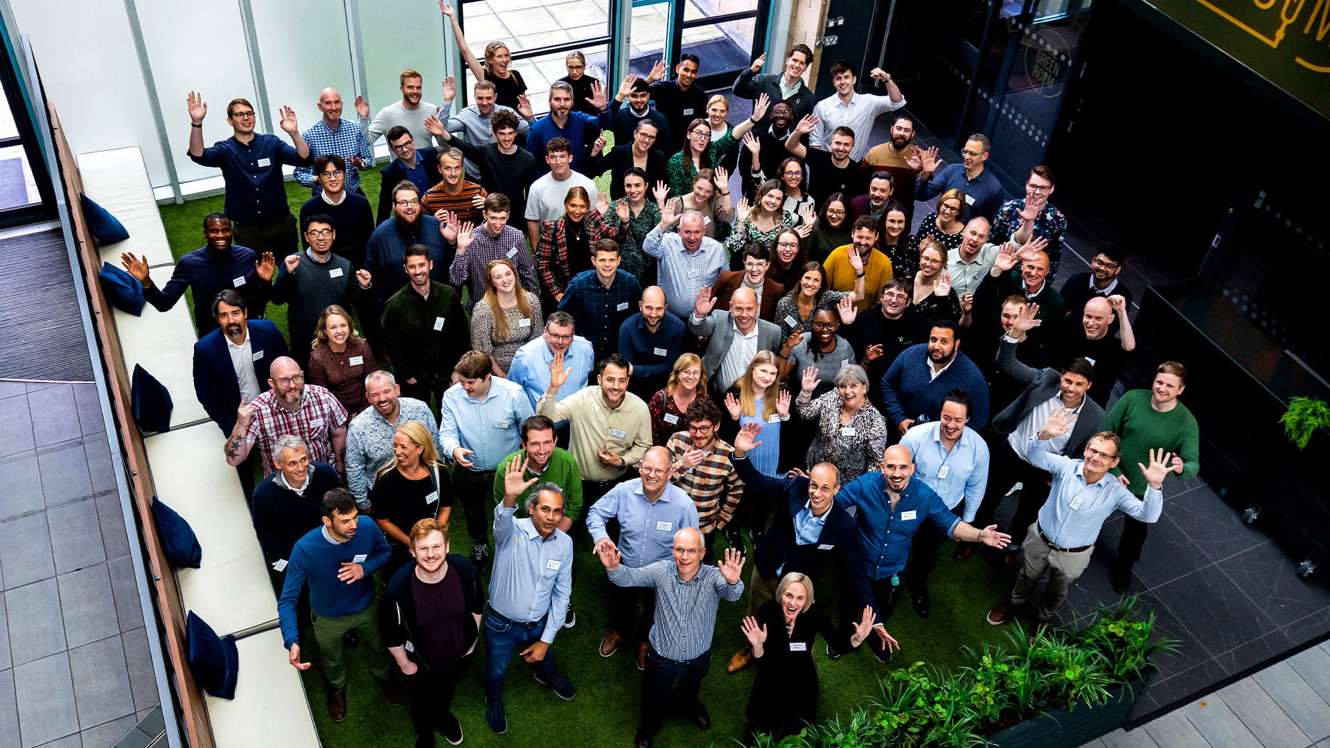 A group of people looking up whole smiling