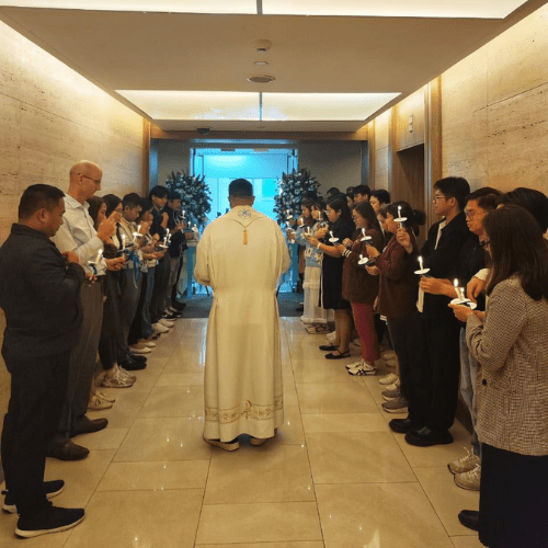 Priest blessing the new Haskoning office in the Philippines