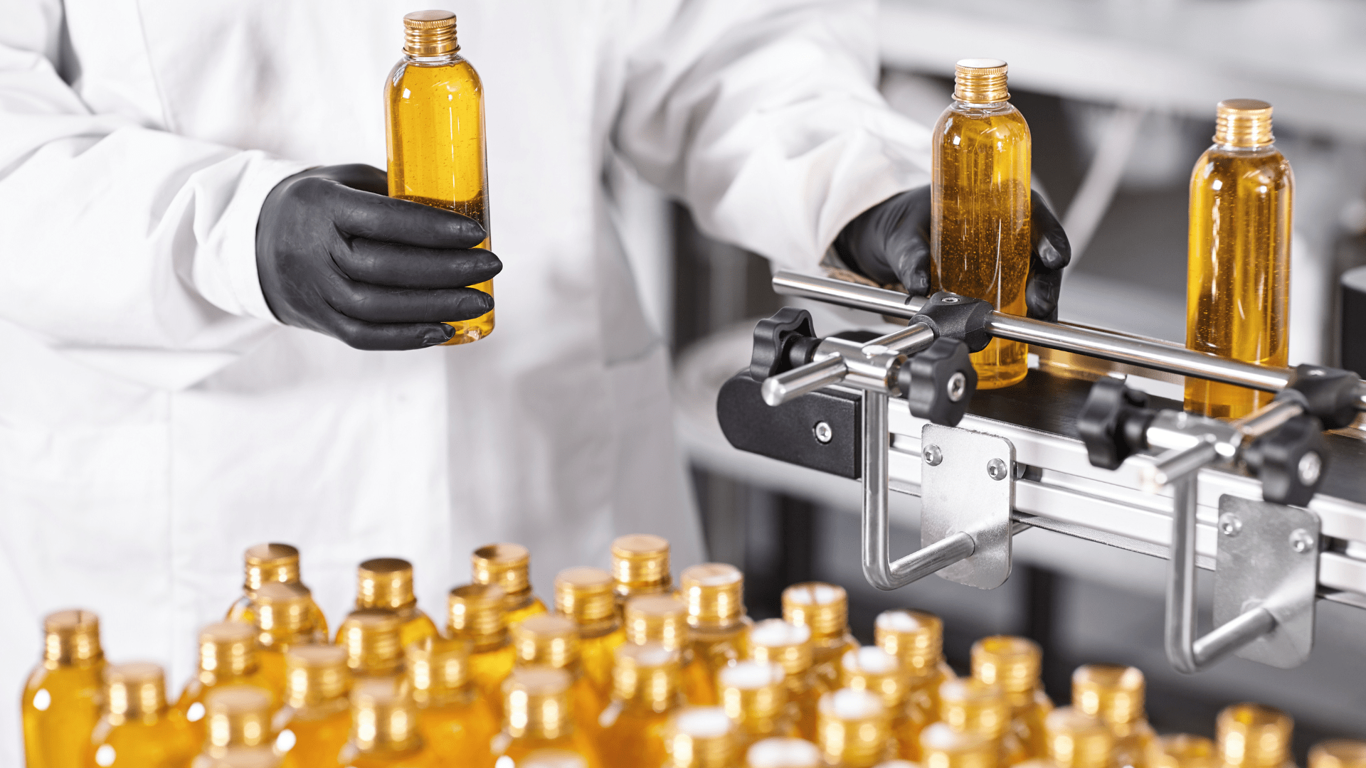 cosmetic bottles being filled and prepared for packaging