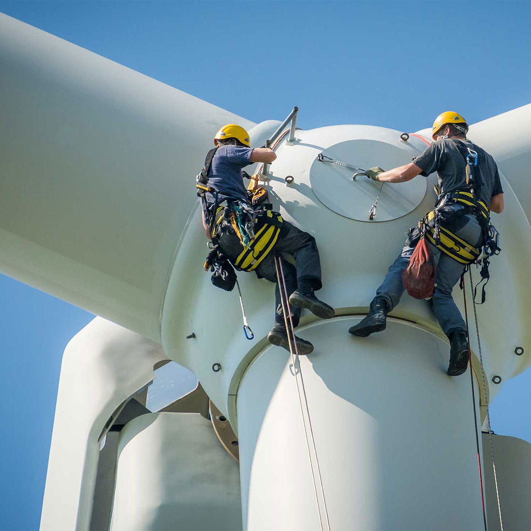 People working on wind turbine