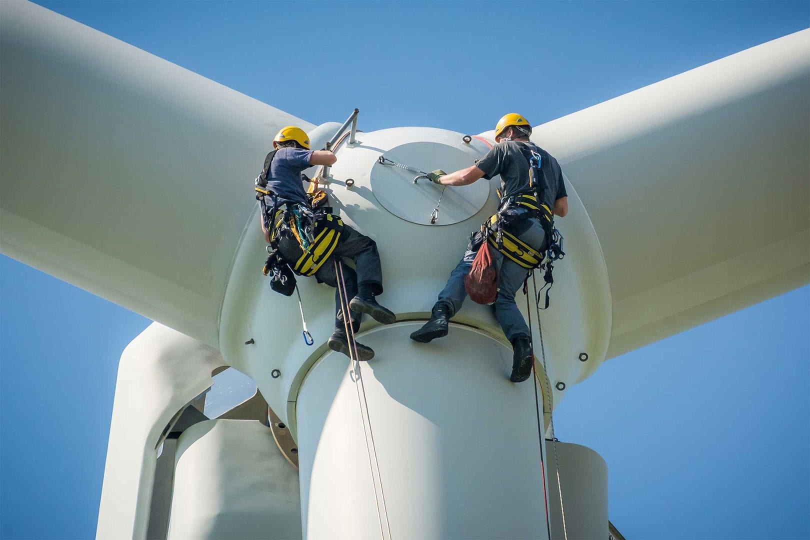 People working on wind turbine