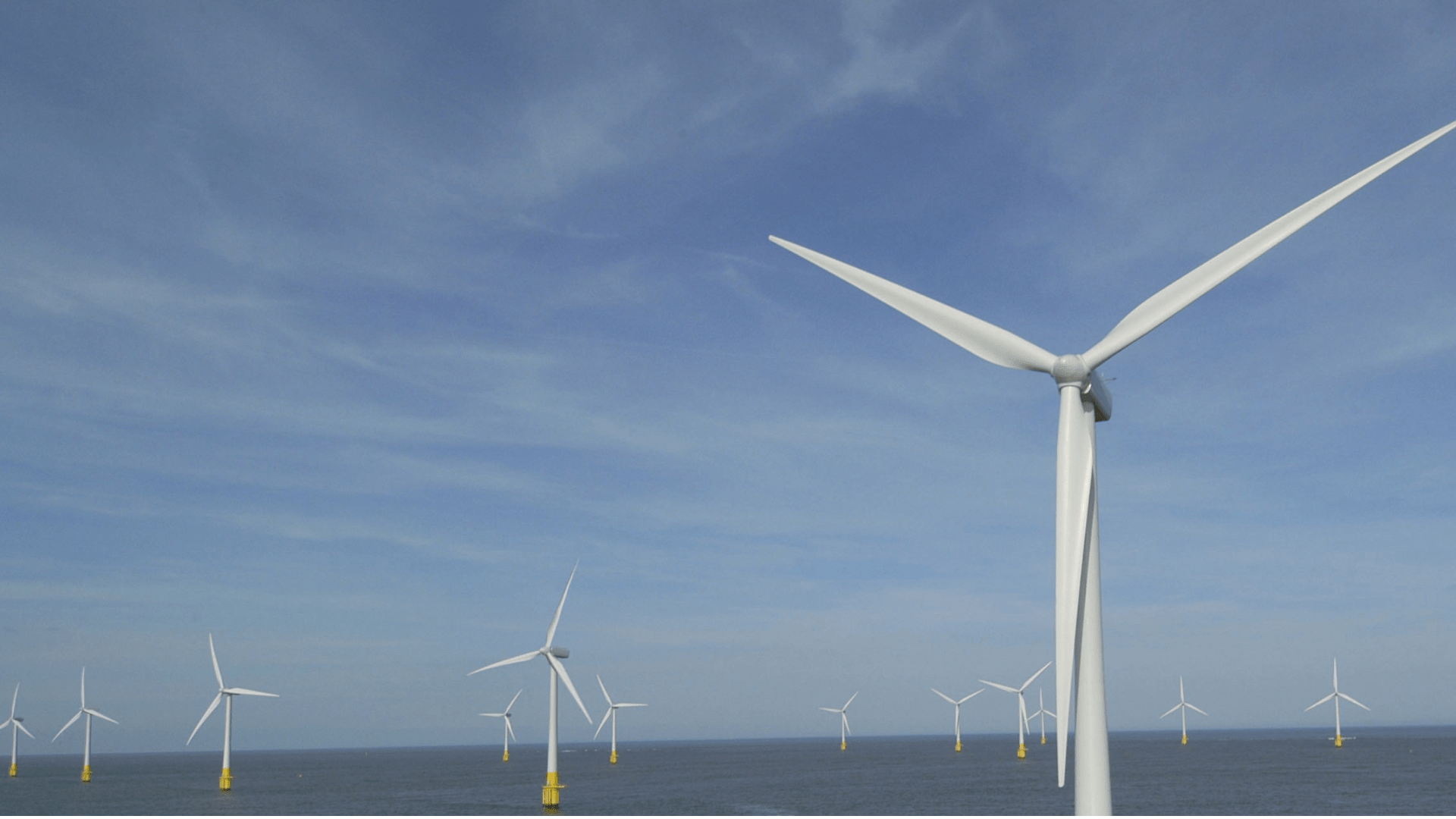 offshore wind farm several wind turbines in the ocean