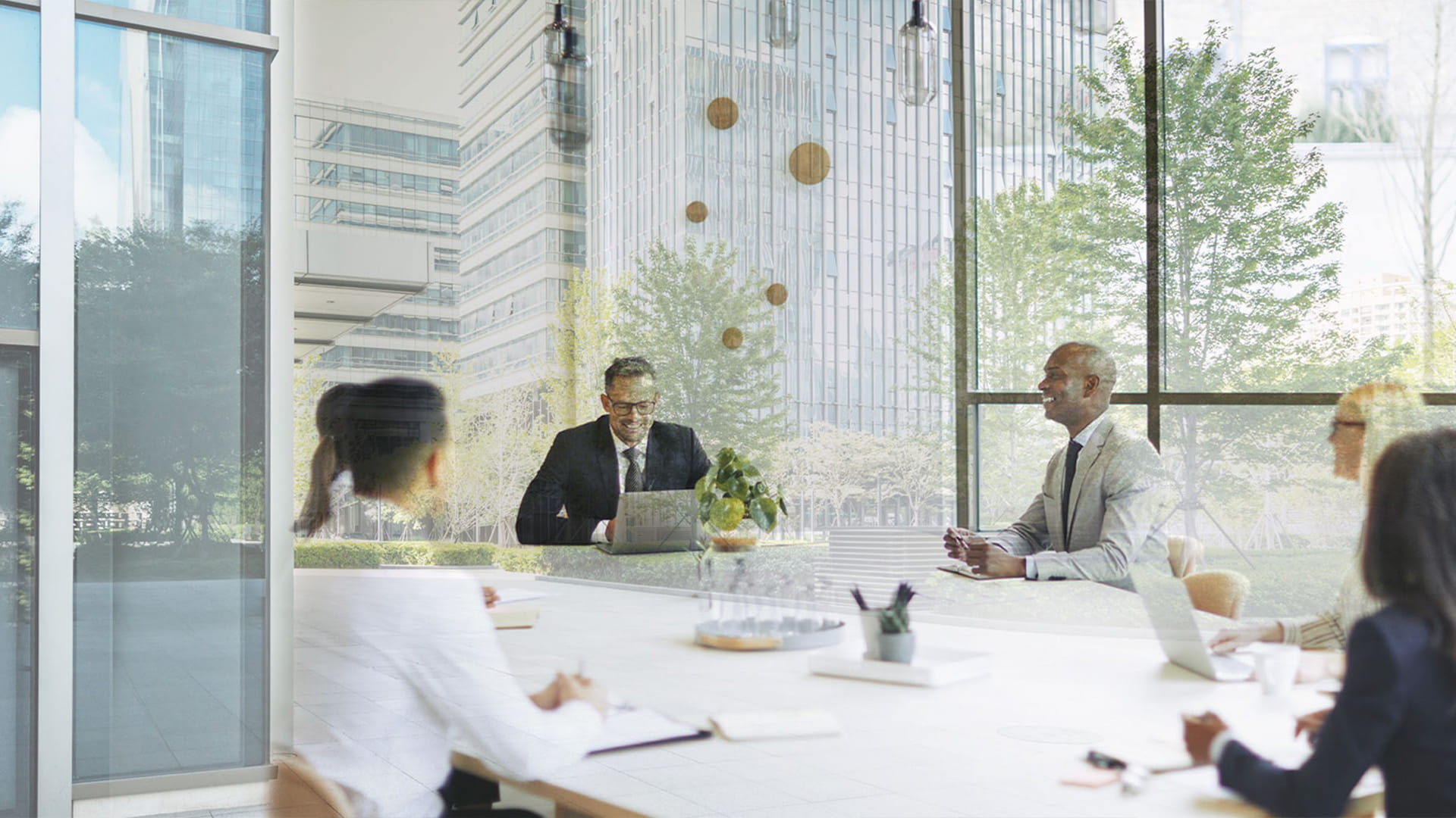 Consumer industry managers discussing ESG goals and ESG investments for corporate capital markets