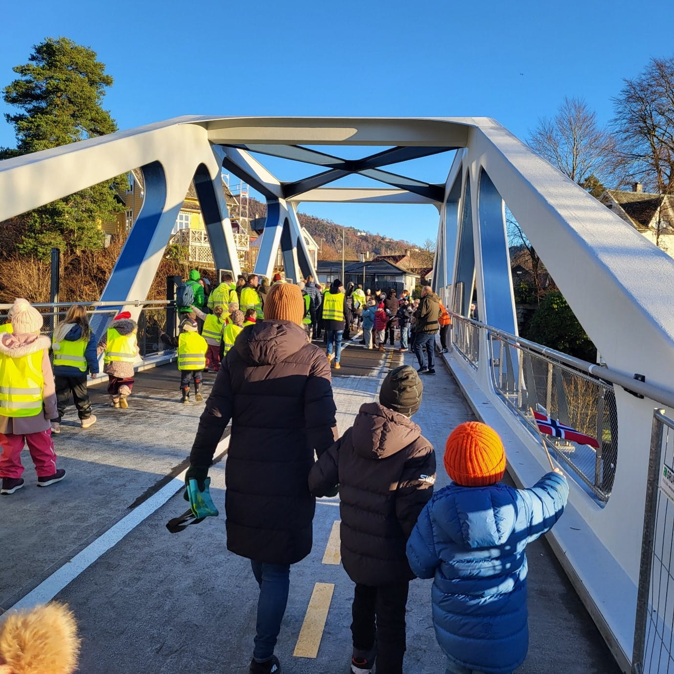 People walk on the bridge