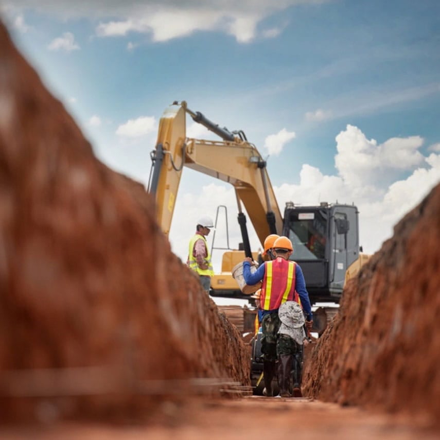 Working at coastline, Bacton, UK