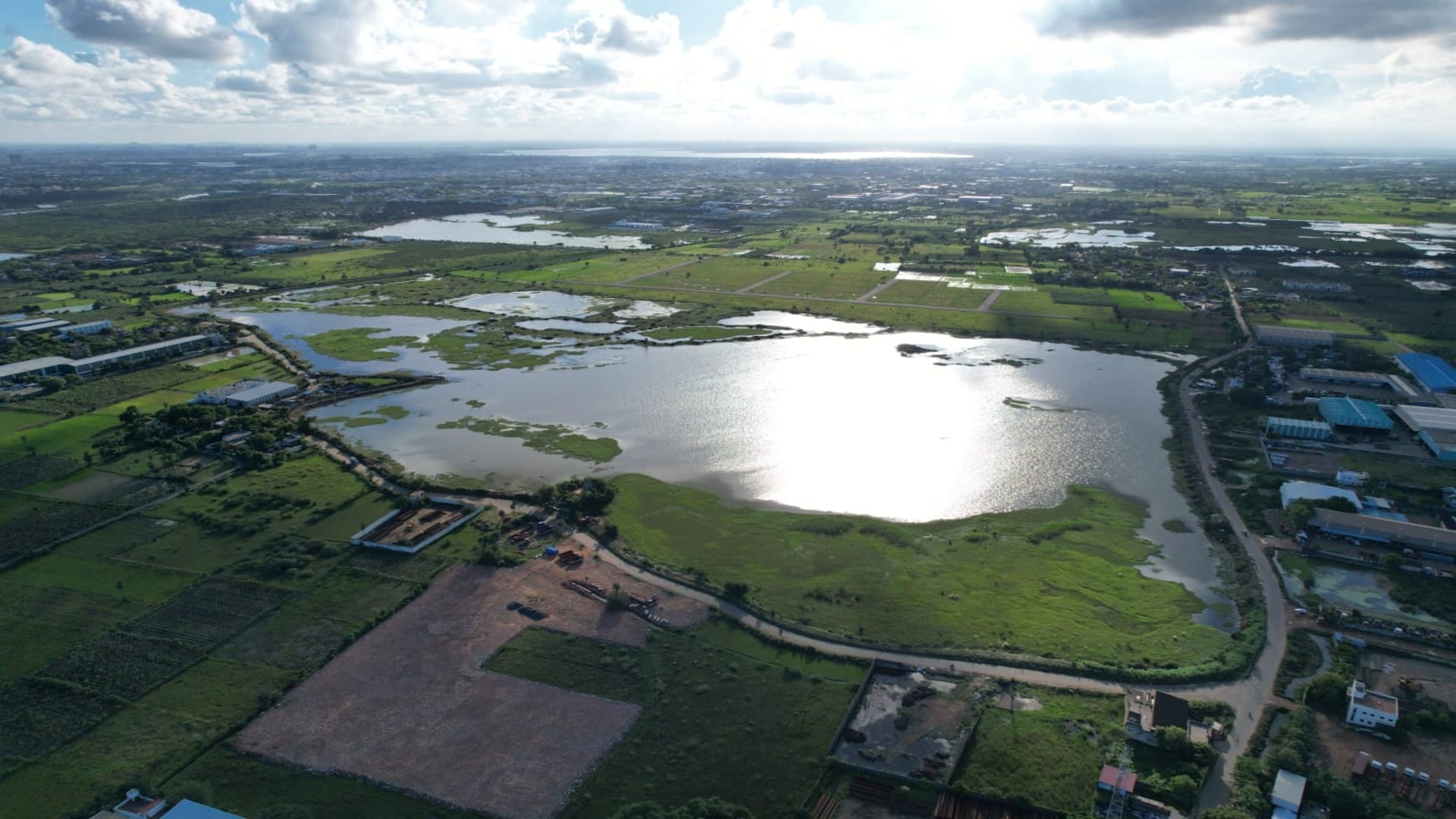 Aerial view of the Kosasthalaiyar Basin area in Chennai before intervention, showing flood‑prone urban land and water bodies historically affected by high flood risk, groundwater depletion and biodiversity loss.