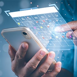 Man looking at calendar to book csrd session