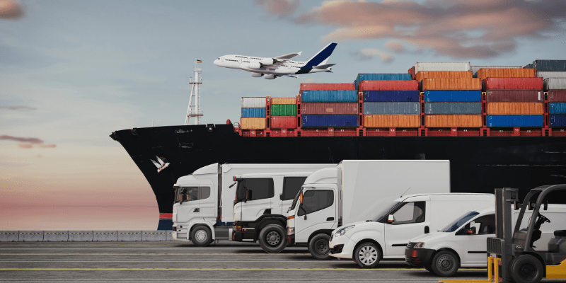 Cargo ship, aircraft and trucks illustrating supply chain network design, logistics optimisation and multimodal transport operations.