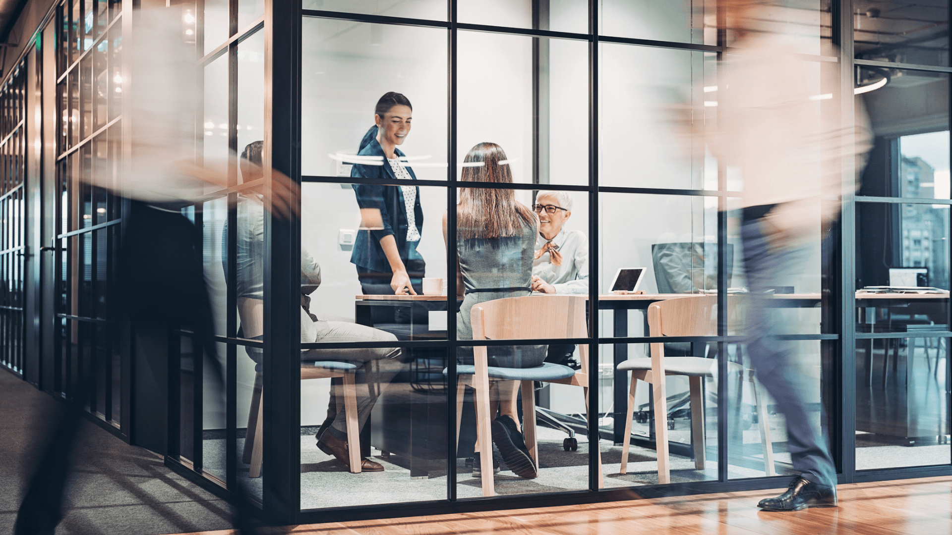 Team collaboration on industrial investment decisions, combining strategic, financial and engineering expertise in a modern office setting.