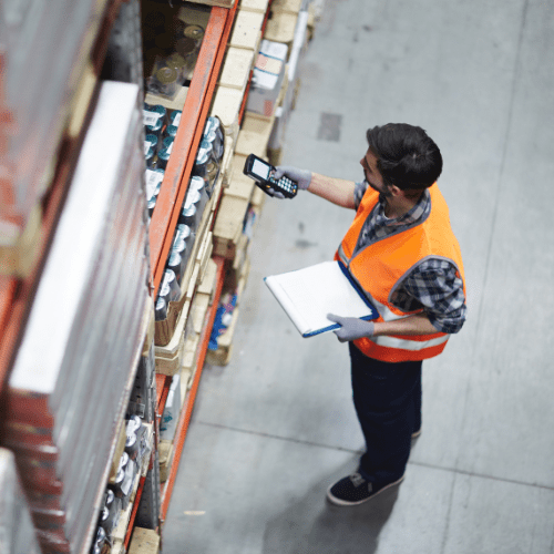Man in a warehouse for industry and supply chain