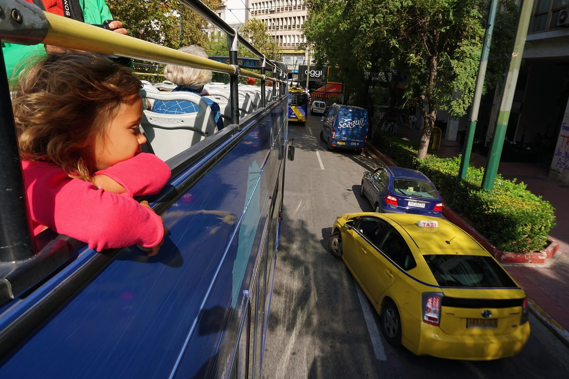 Young girl sitting in bus in Athens, Greece