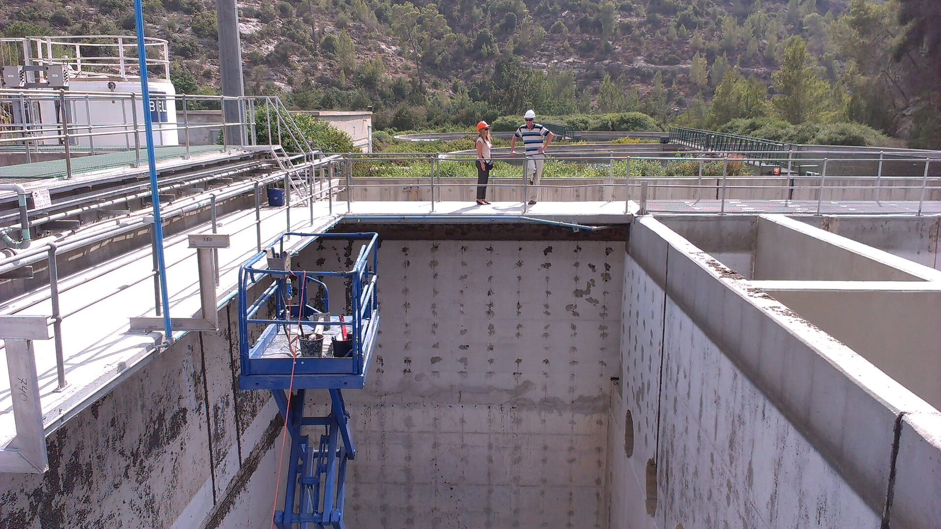 engineers standing next to a construction site
