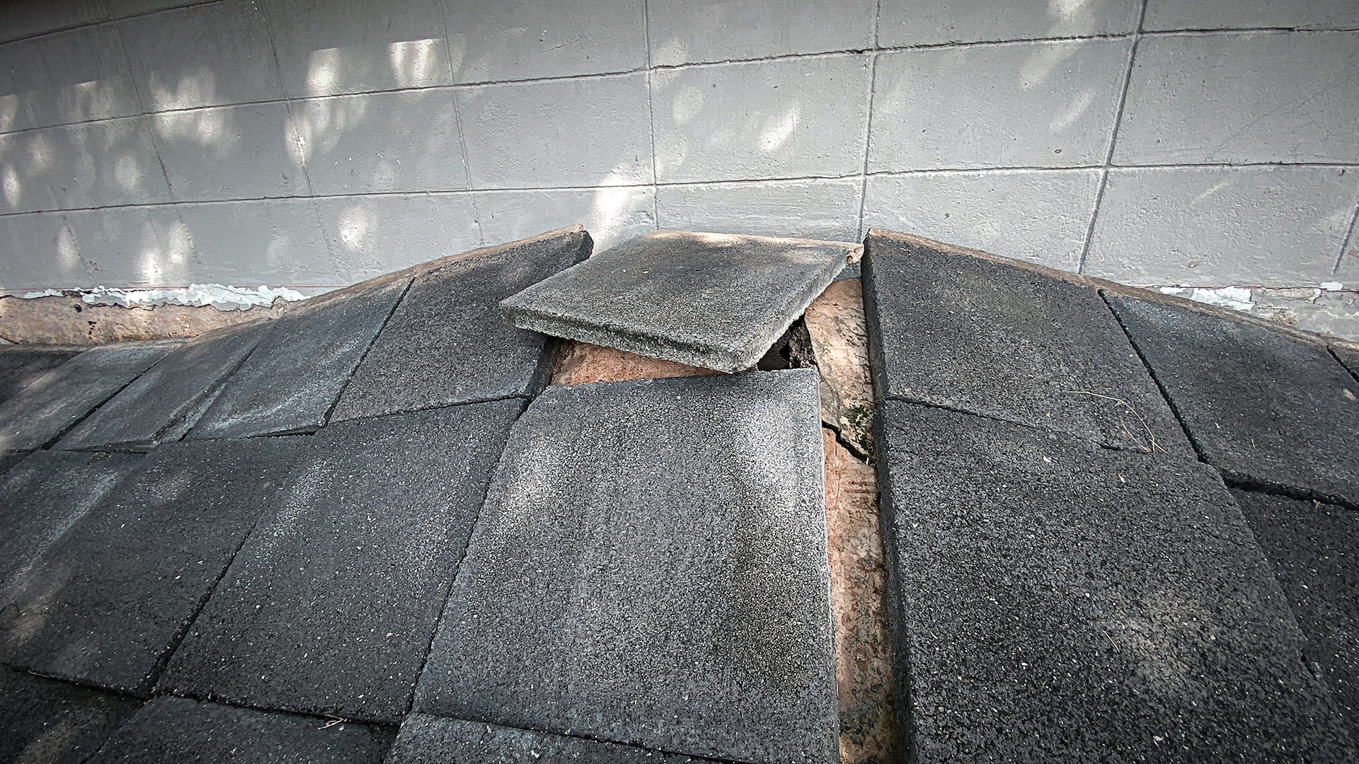 land subsides from the house creating a gap between the house and land