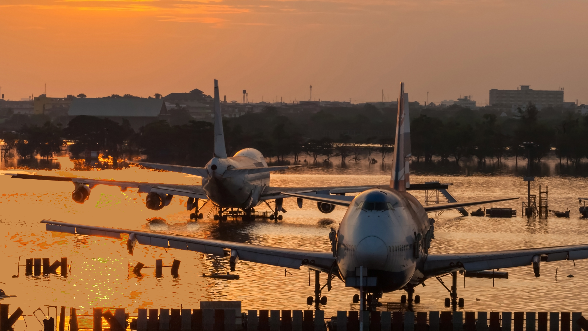 an aircraft on a flooded runway