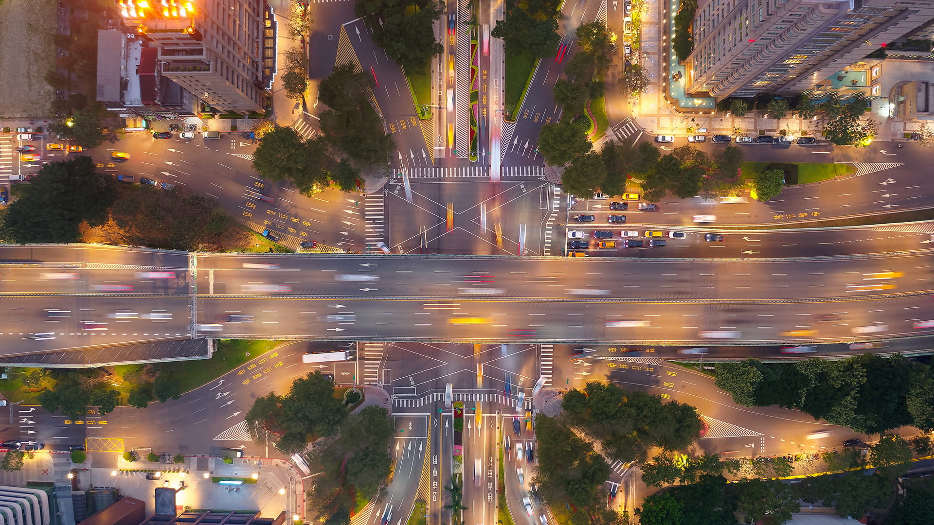 aerial view of a busy interchange with many cars