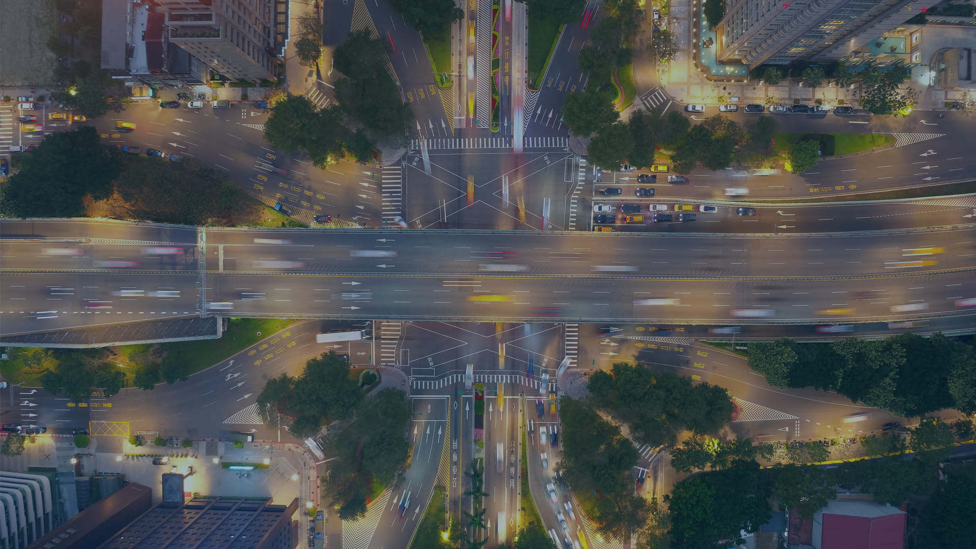 aerial of cars on busy highway interchange