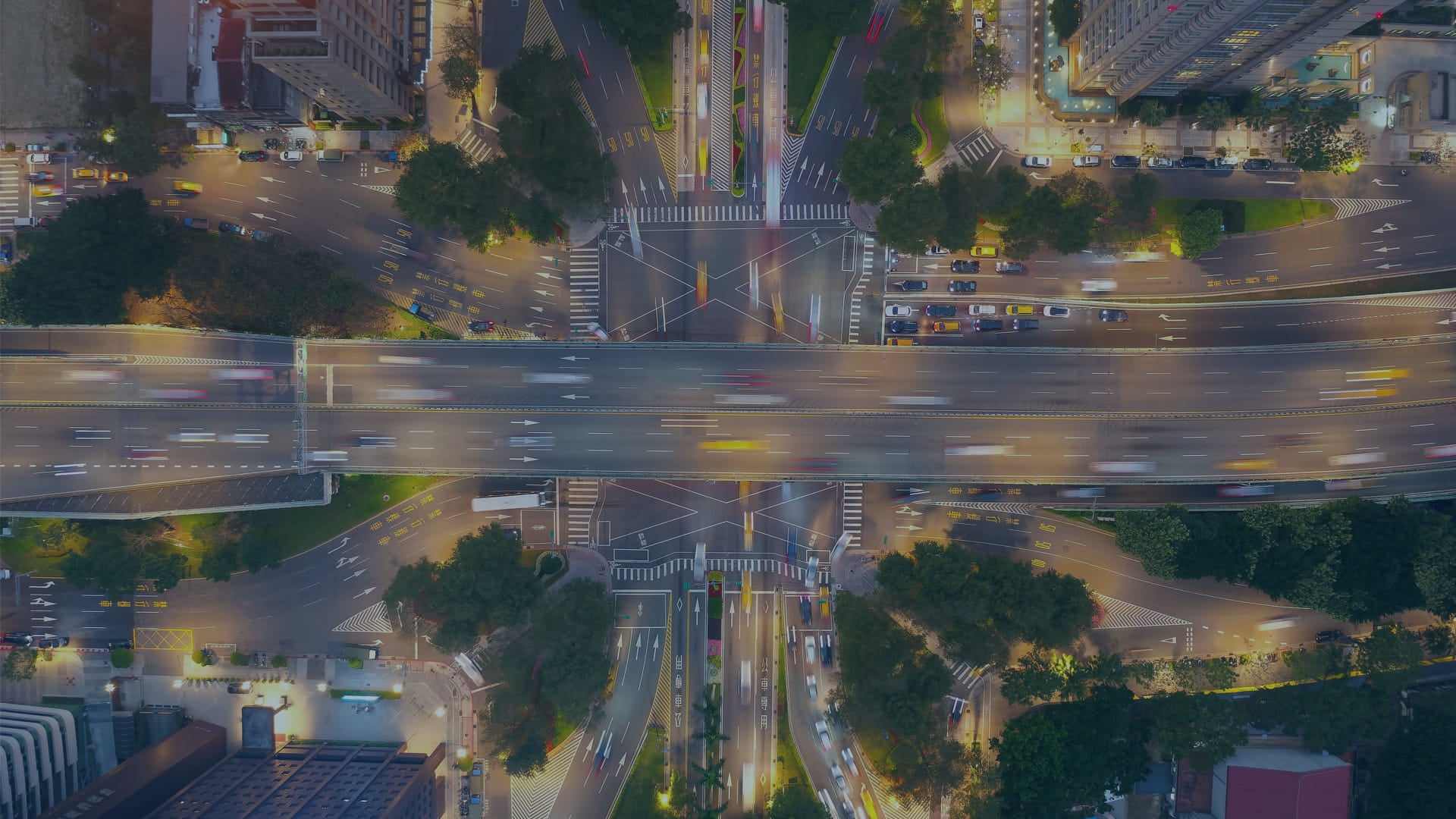 aerial of cars on busy highway interchange