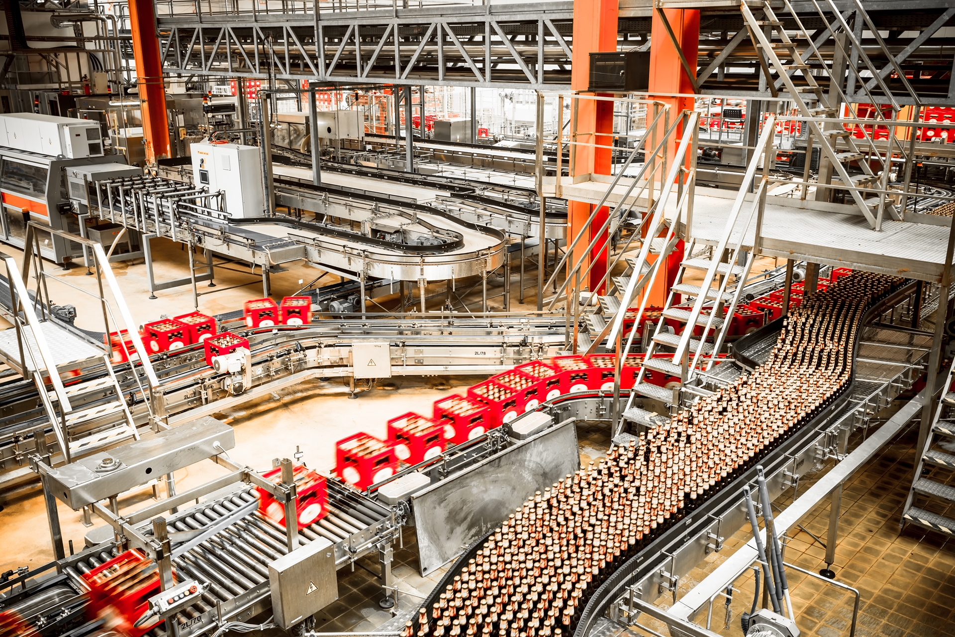 Bottles moving down a conveyor belt