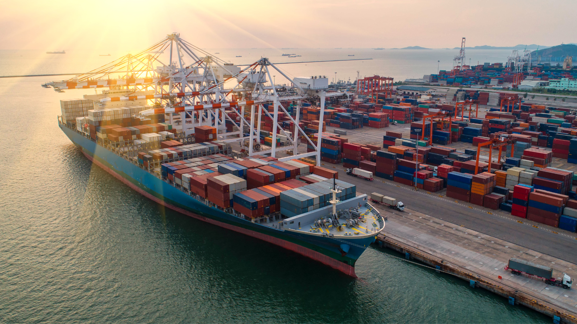 A cargo ship unloading at a busy port