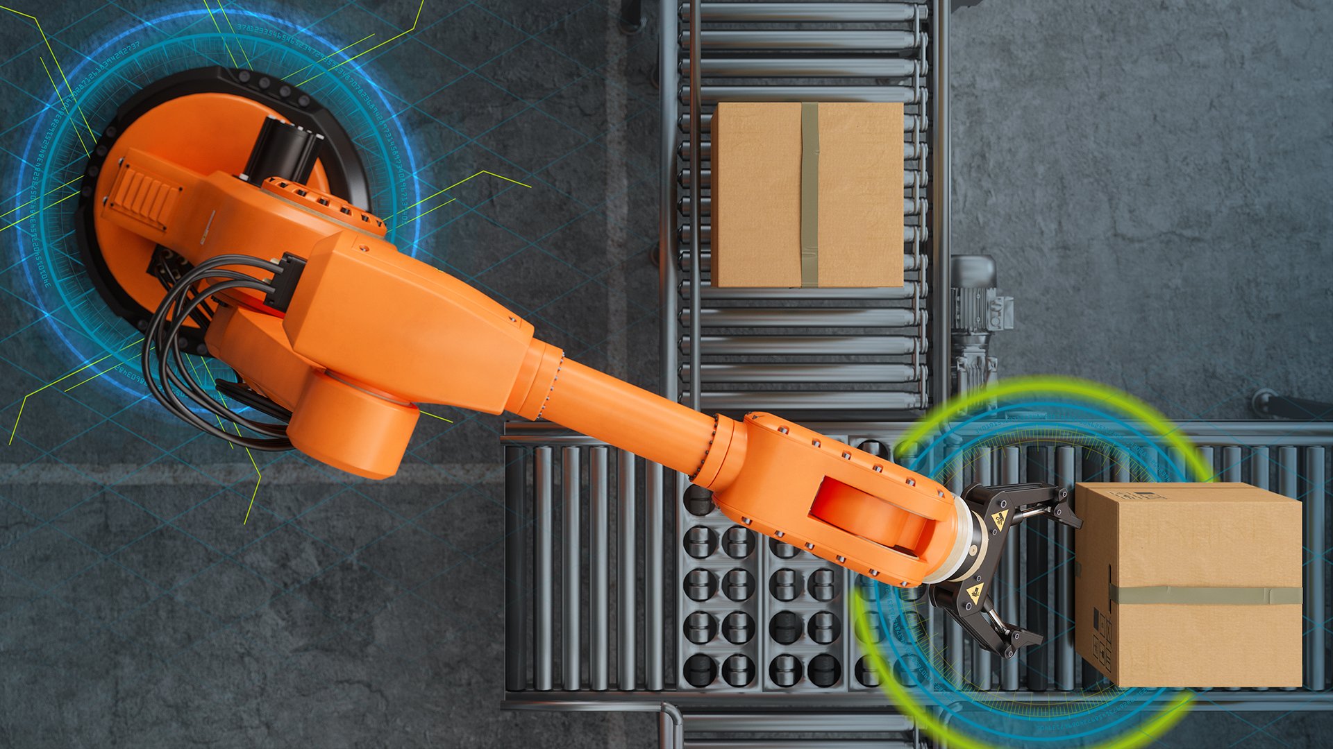 An aerial view of packing machinery next to a conveyor belt within a light industry factory