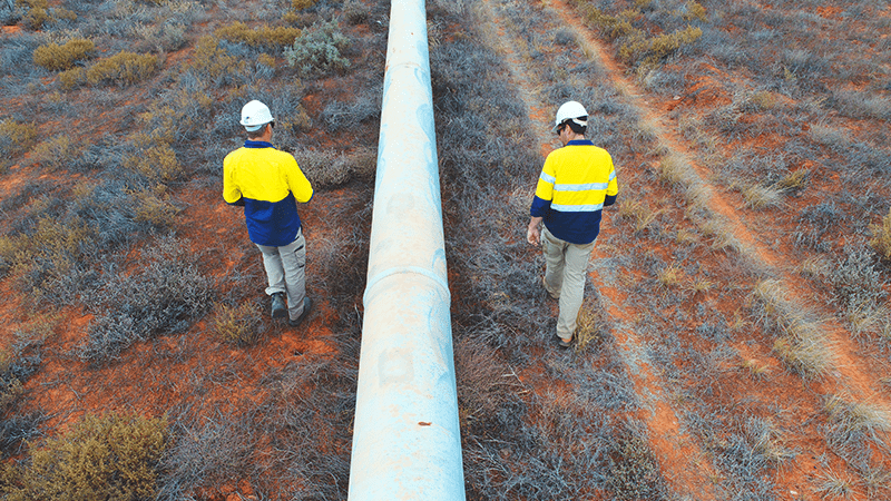 Maintenance operators checking water pipes