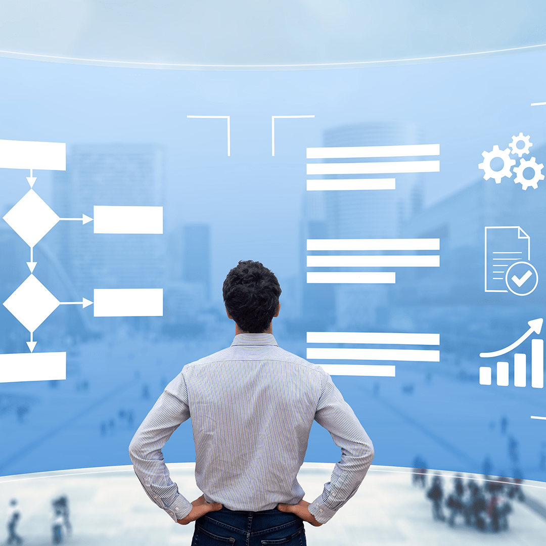 Man looks at BPM graphic wall