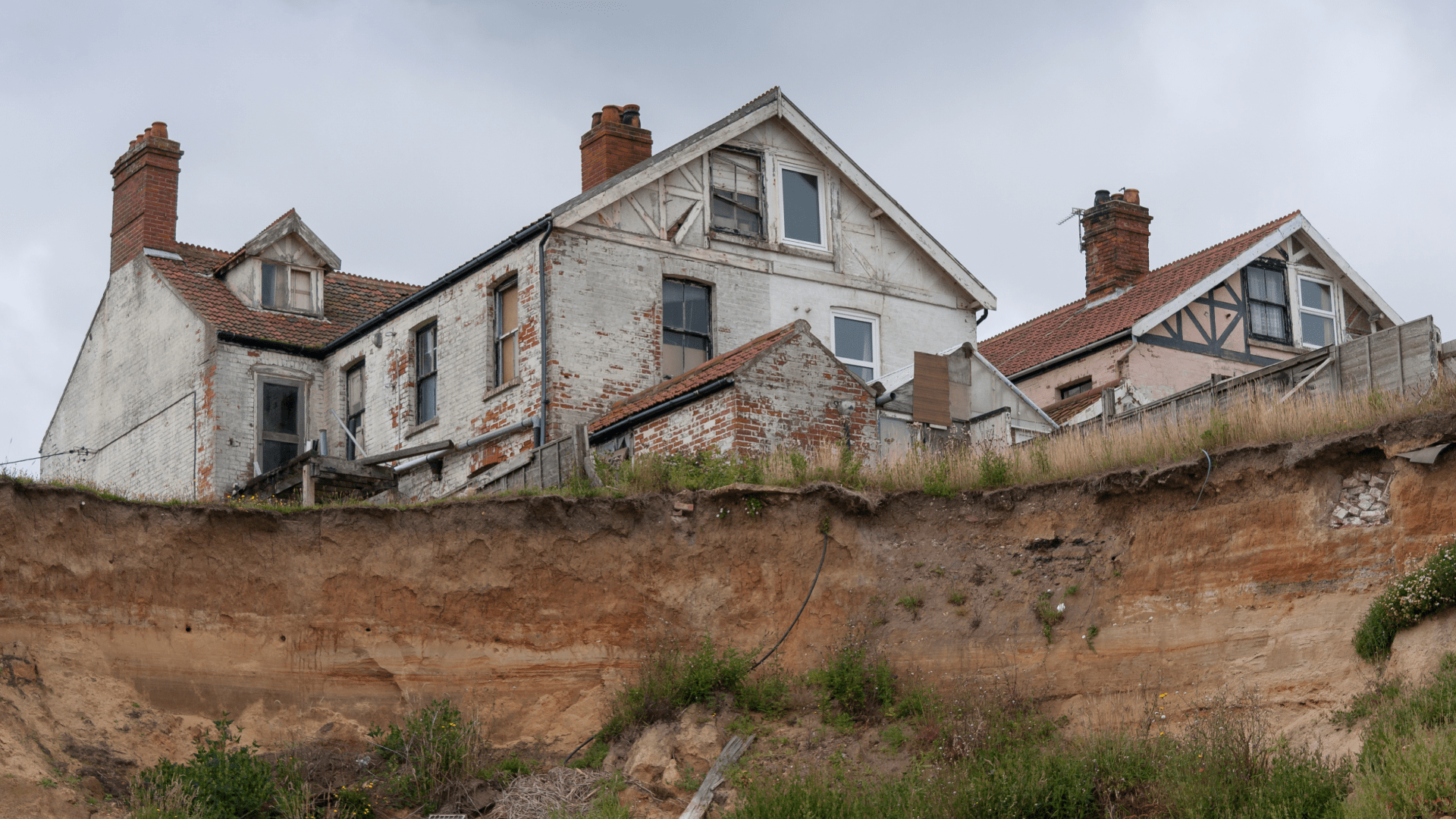 house next failing cliff showcasing coastal erosion